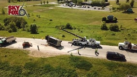 Gravel truck overturns in East Troy