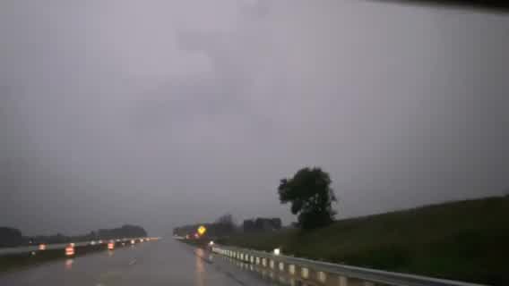 Lightning, heavy rain near West Bend