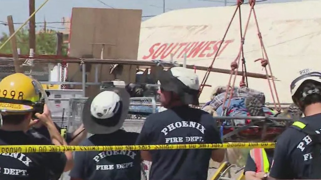Construction worker rescued after falling into 8-foot trench in Phoenix ...