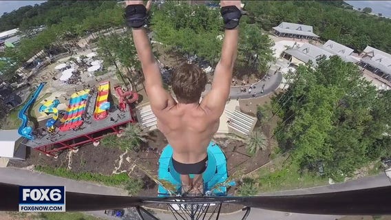 Former state champion diver fights fear from 27 meters high