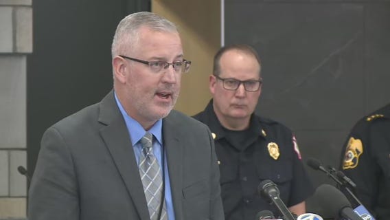 Waukesha Schools Superintendent Jim Sebert speaks with media