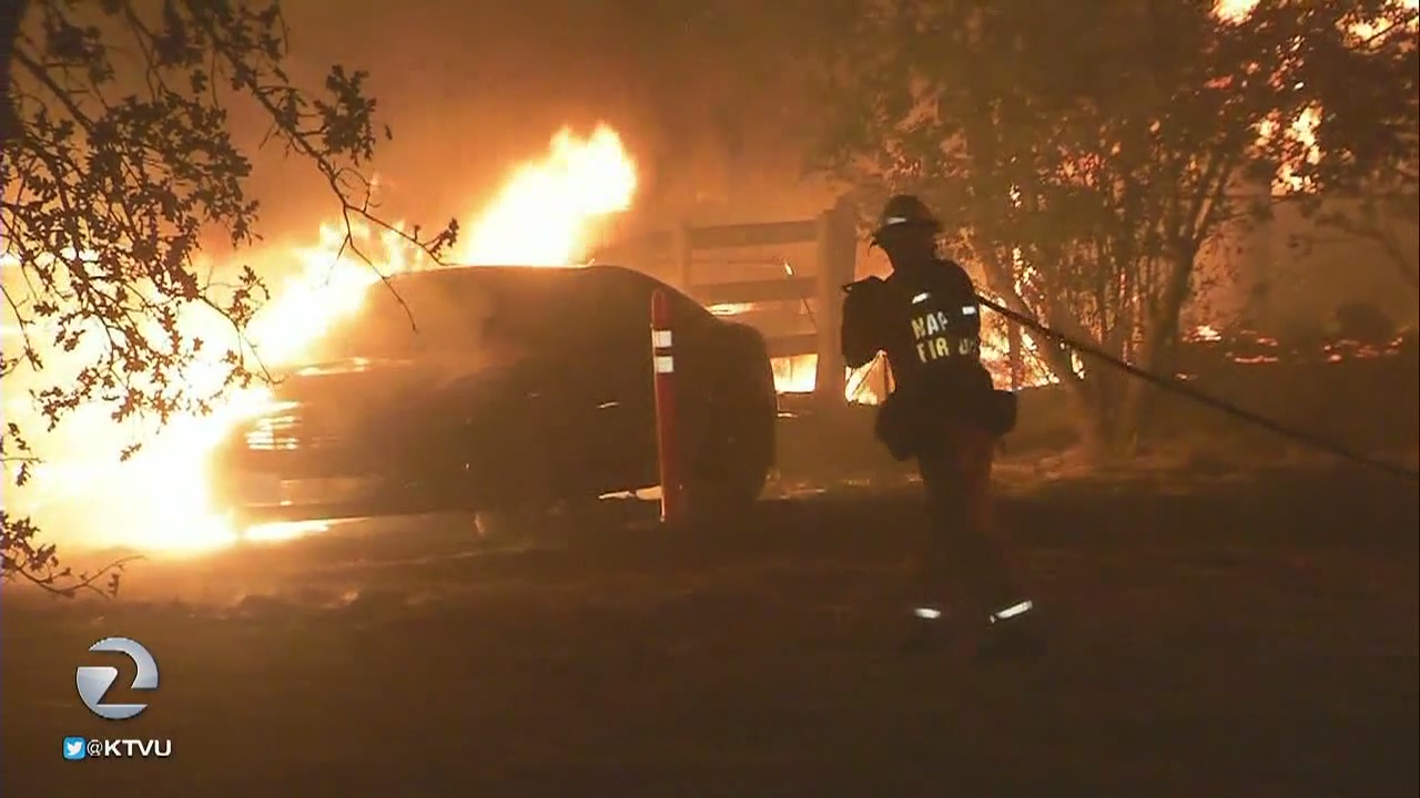 At least 10 dead as fires rage in California wine country