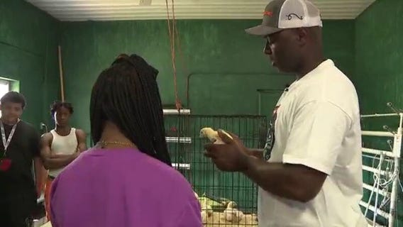 Former basketball stars inspire Milwaukee kids on farm