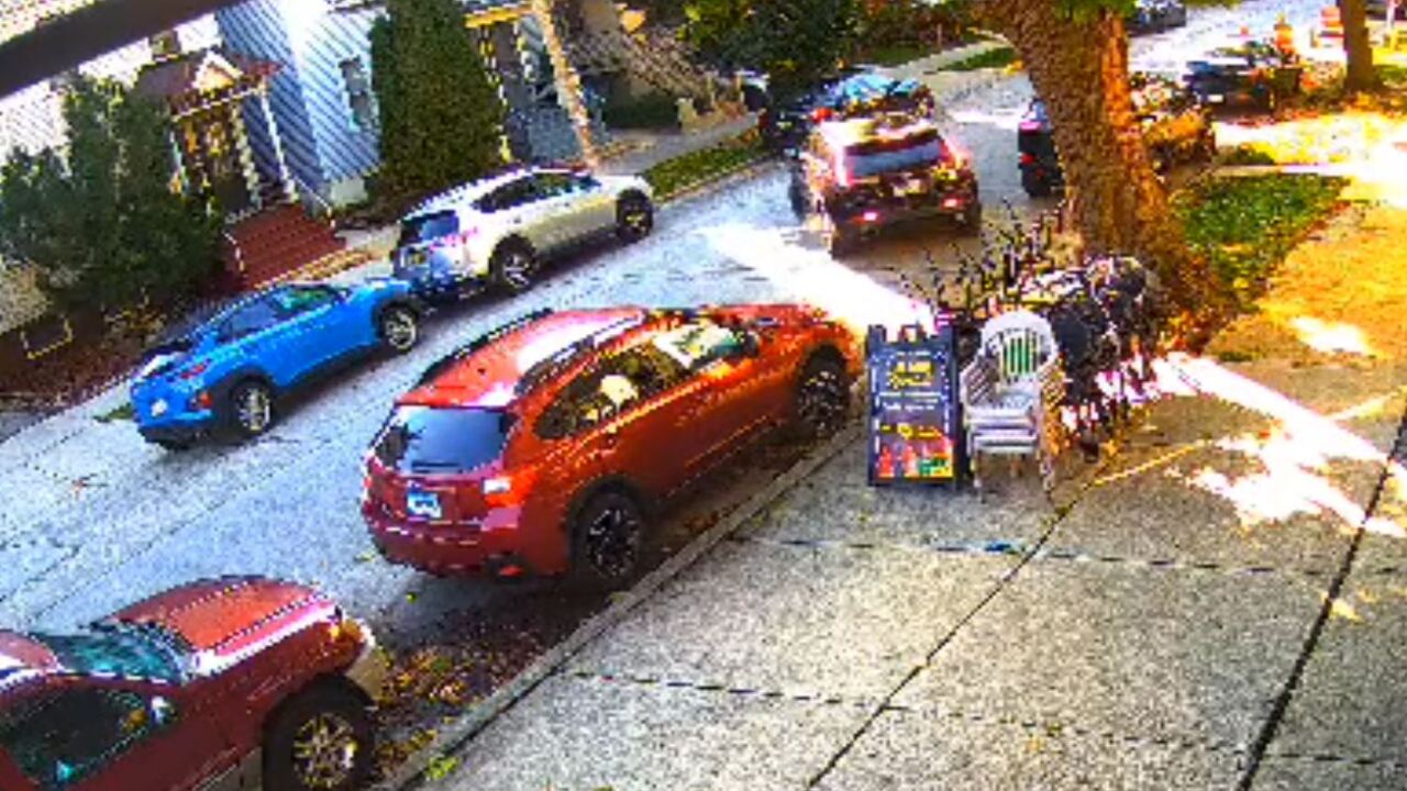 Surveillance shows car break-in across from Michels newser