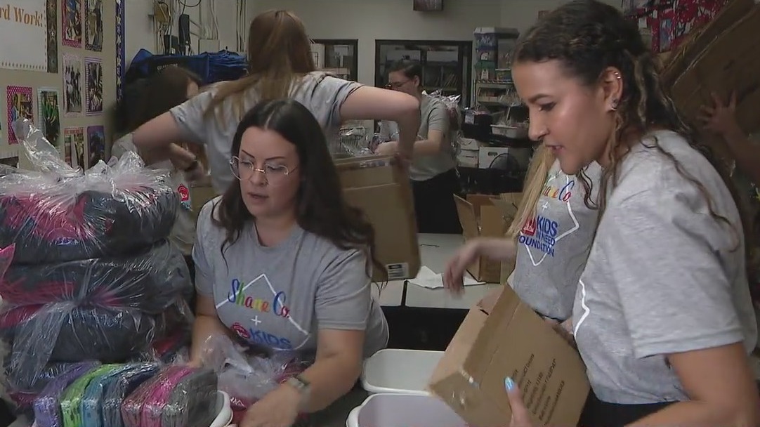 Well-known jewelry company fills backpacks with school supplies