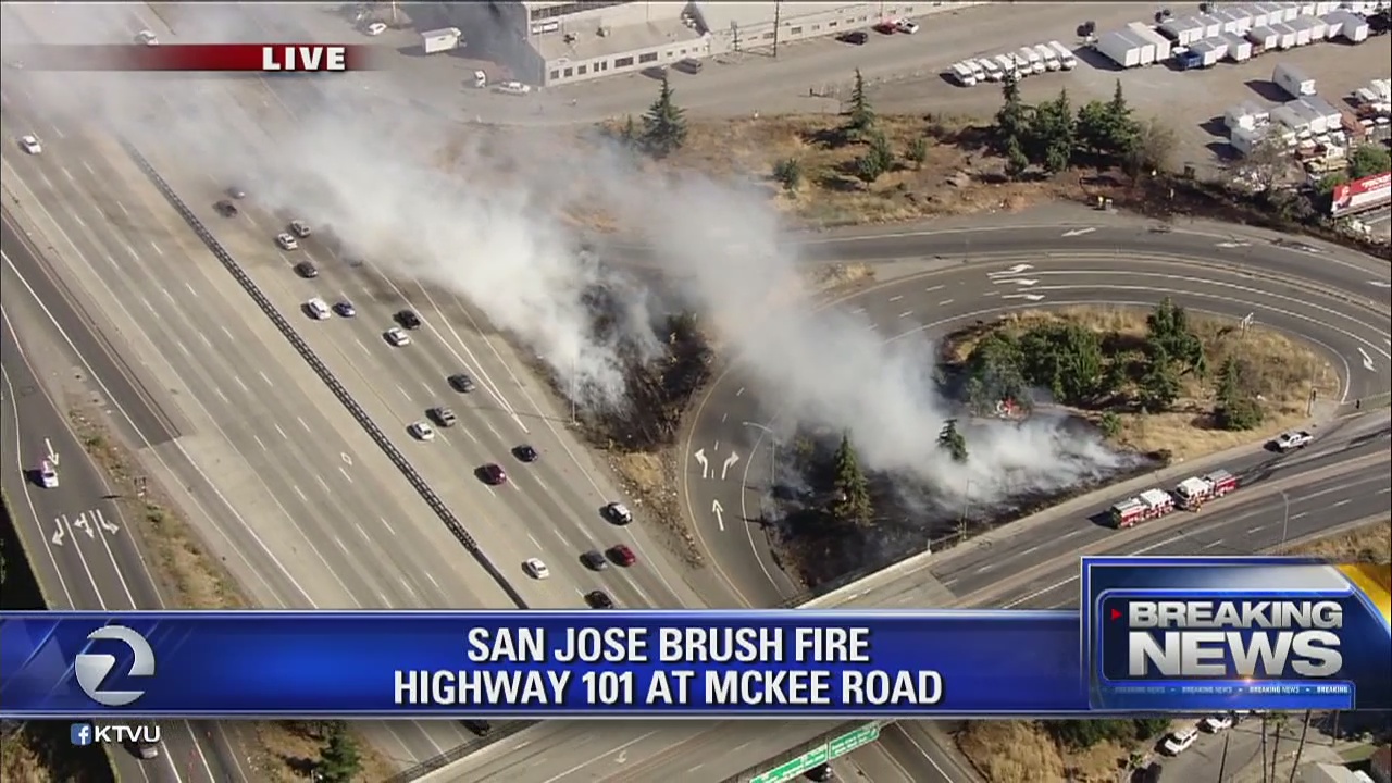 Brush fire burns near Highway 101