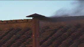Black smoke signals no new pope chosen in initial ballot