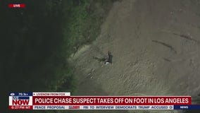 Police chase suspect takes off on foot