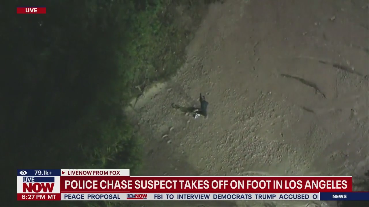 Police chase suspect takes off on foot
