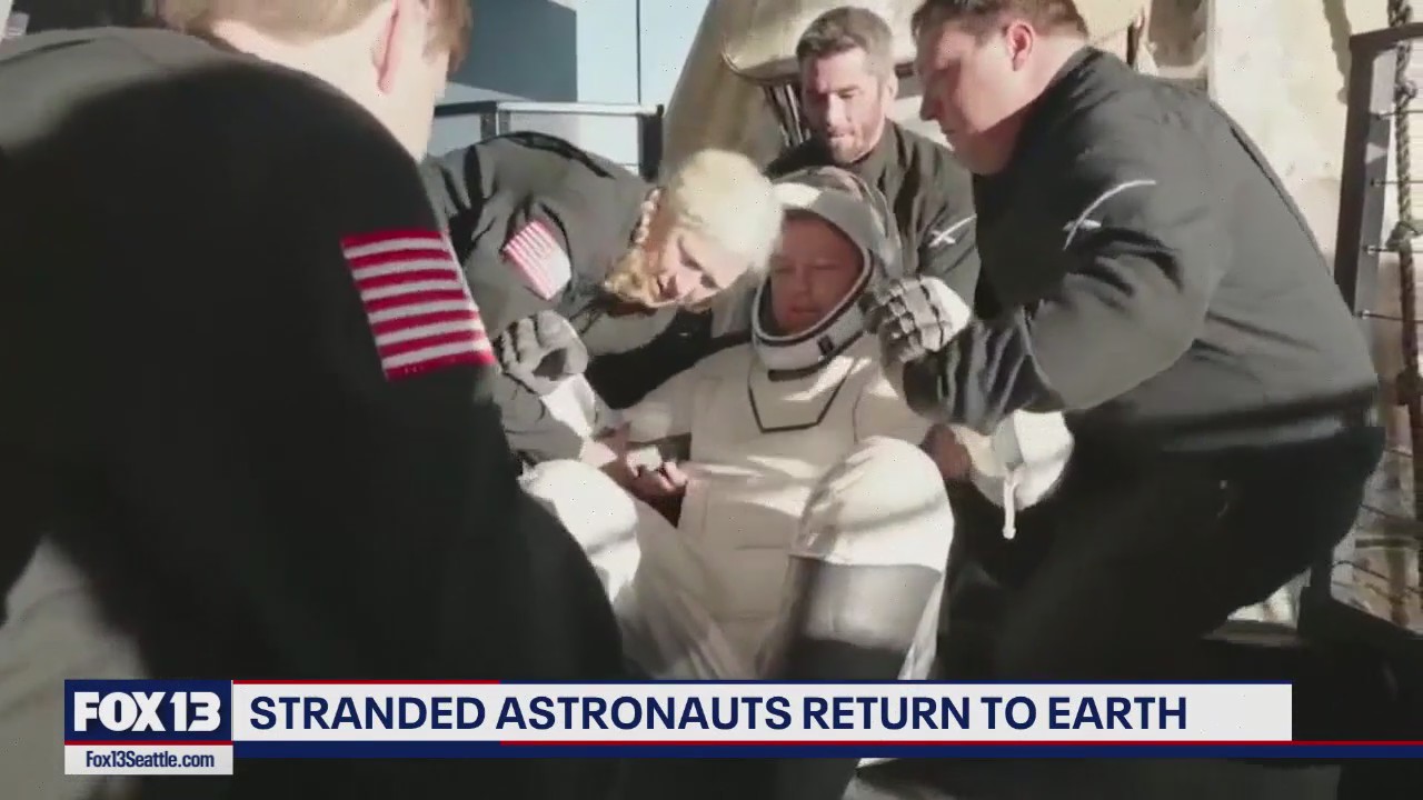 Stranded NASA astronauts splashdown on Earth