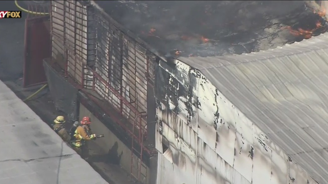 Crews respond to fire at a South Los Angeles warehouse