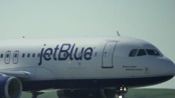 JetBlue raises checked luggage fees