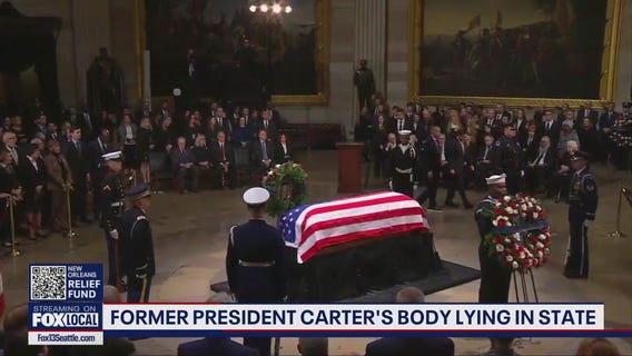 Former president Carter's body lying in state
