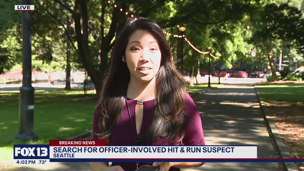 Seattle police searching for suspect after officer hit by stolen SUV