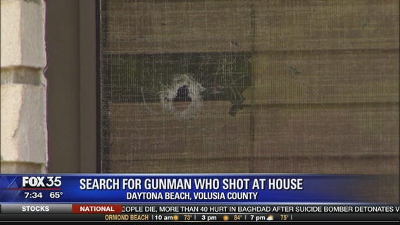 Search for gunman who shot at house
