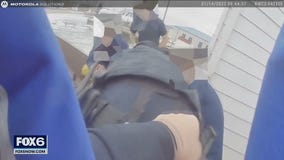 Kenosha lake rescue; fisherman slipped off pier