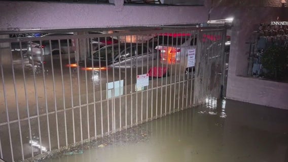 Rain floods parking garages in Palms