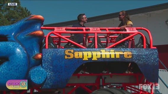 Brian MacMillan rides monster truck at King County Fair