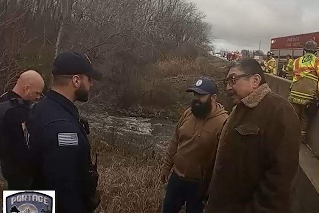 Bodycam shows fishermen speaking with Portage police after man's rescue