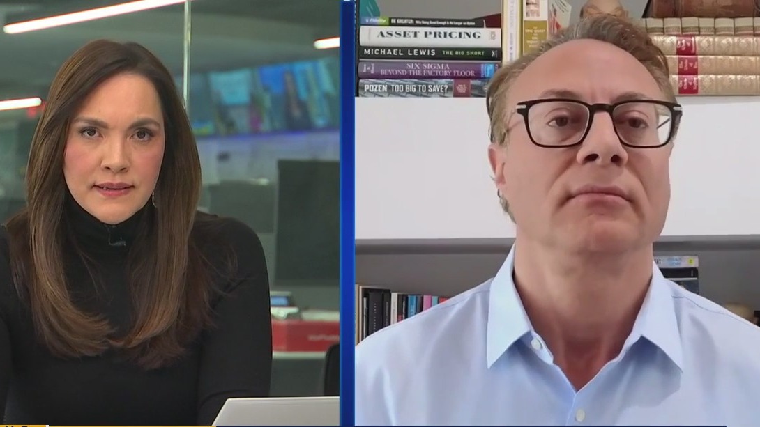 Stocks swing wildly amid trade war fears