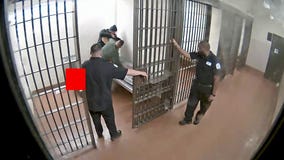 'Appalling' video shows Chicago cop repeatedly punching man in holding cell