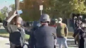 Police and protesters scuffle outside Mayor Garcetti's home