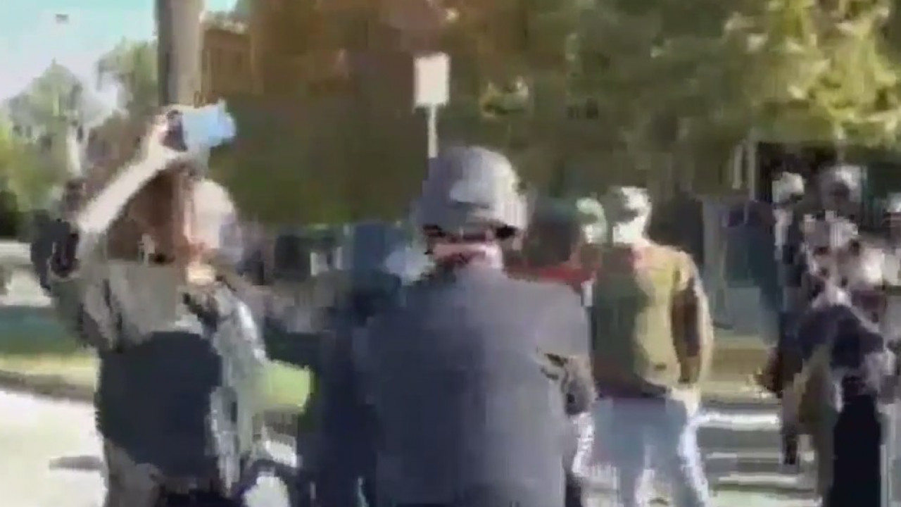 Police and protesters scuffle outside Mayor Garcetti's home