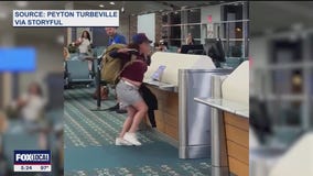 Orlando airport passenger attacks gate monitors