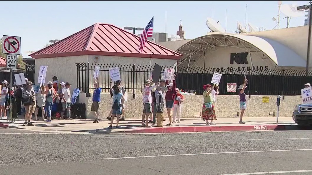Protesters line up outside FOX 10 Phoenix studios