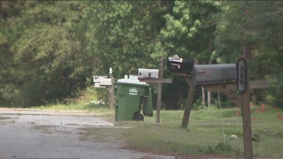 Former postal worker charged with assault