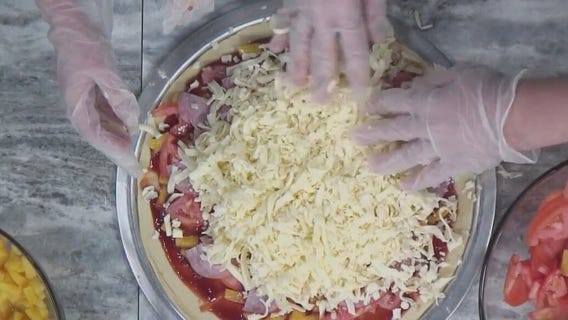 National Hawaiian Pizza Day; does the fruit belong on pizza?