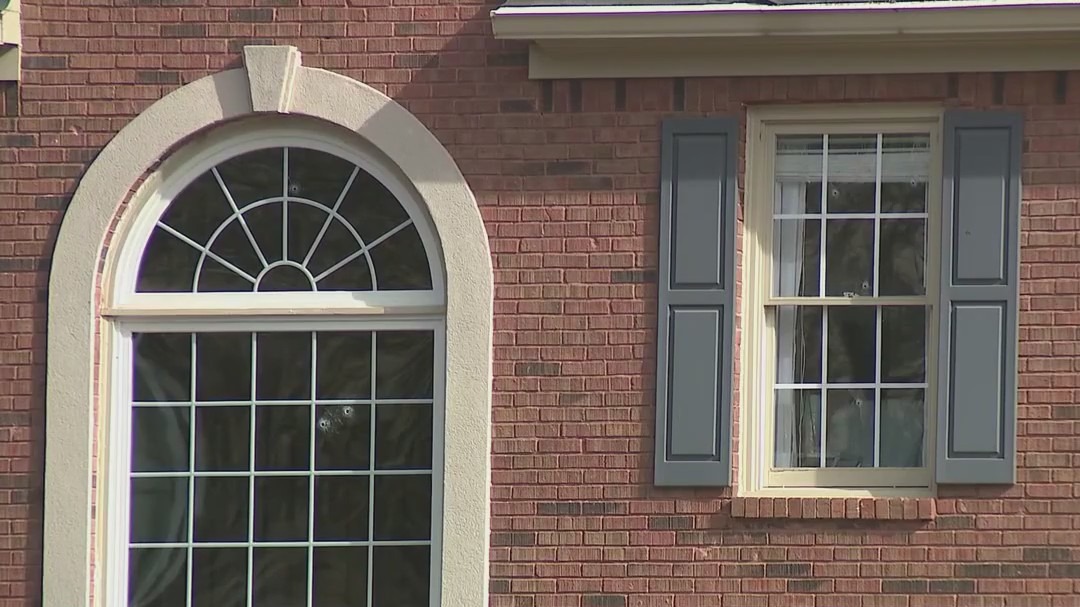 Woman dodges bullets fired by group of armed men