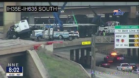 Overturned semi causes major traffic delays on I-35E