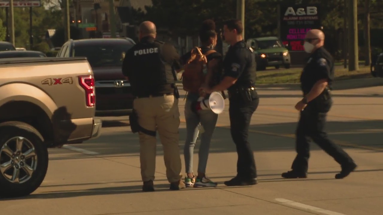 Two arrested for blocking traffic during Shelby Township protest