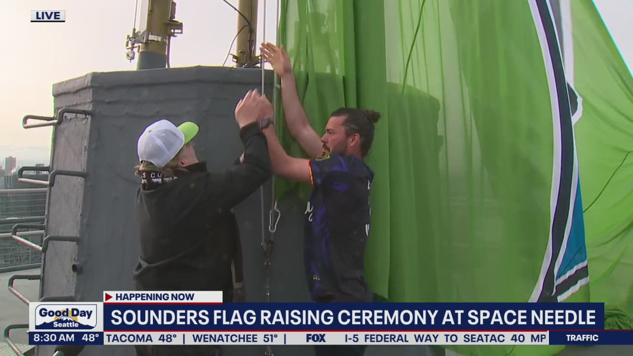 Sounders flag raising ceremony at Space Needle