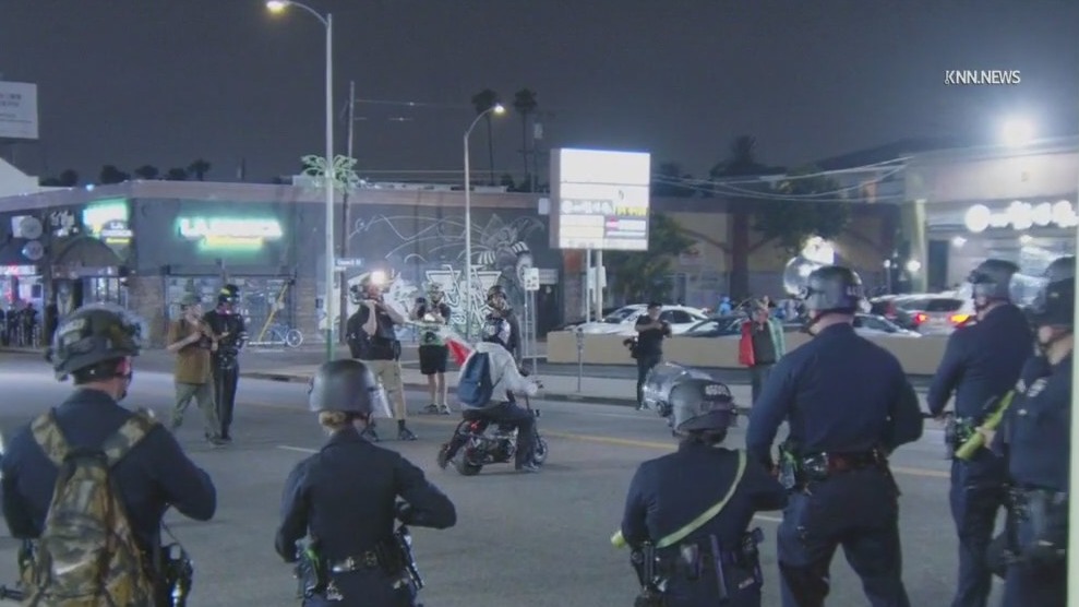 Police break up protests after curfew begins