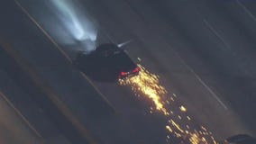 Sparks fly on police chase suspect's car in LA