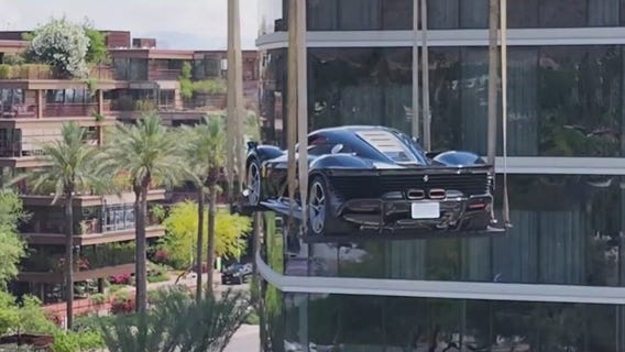 Ferrari lifted onto roof of hotel in Scottsdale