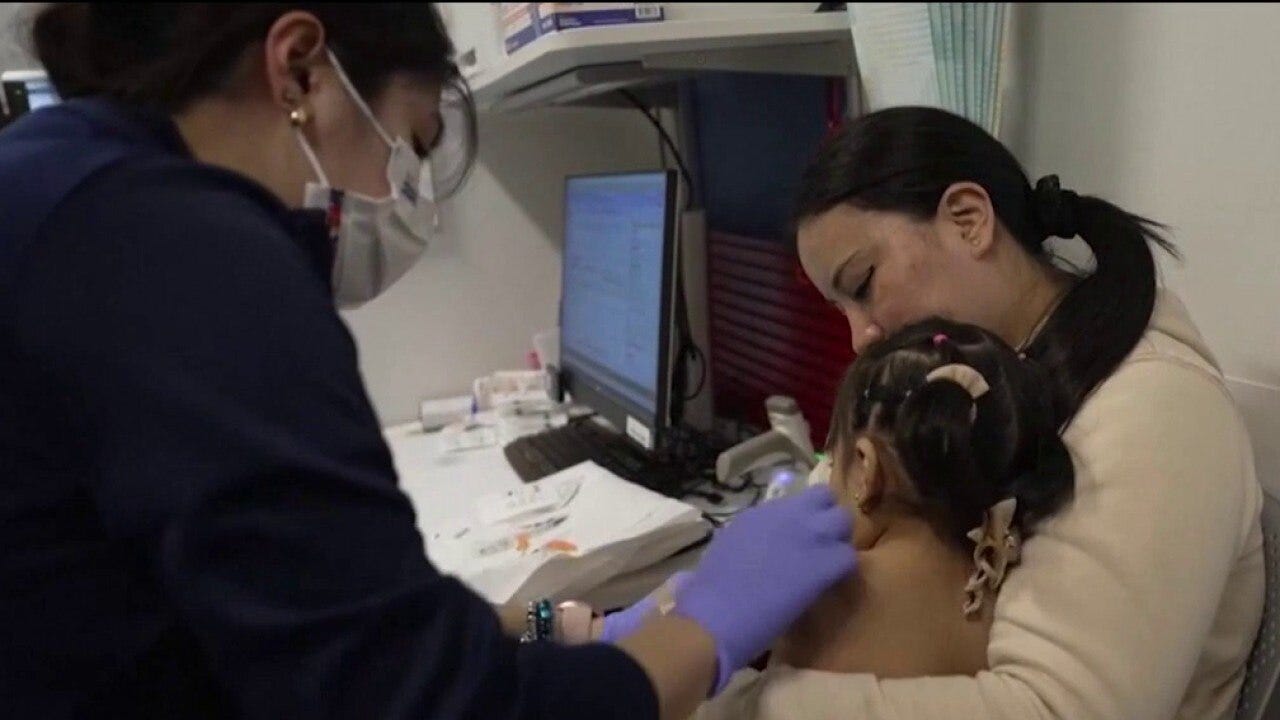 Trump pushes healthcare fix as flu cases surge to record levels