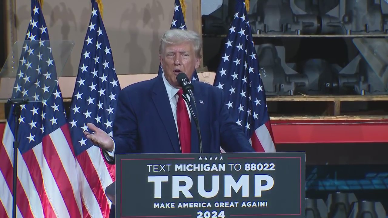 Former President Donald Trump speaks before striking UAW members in Macomb County