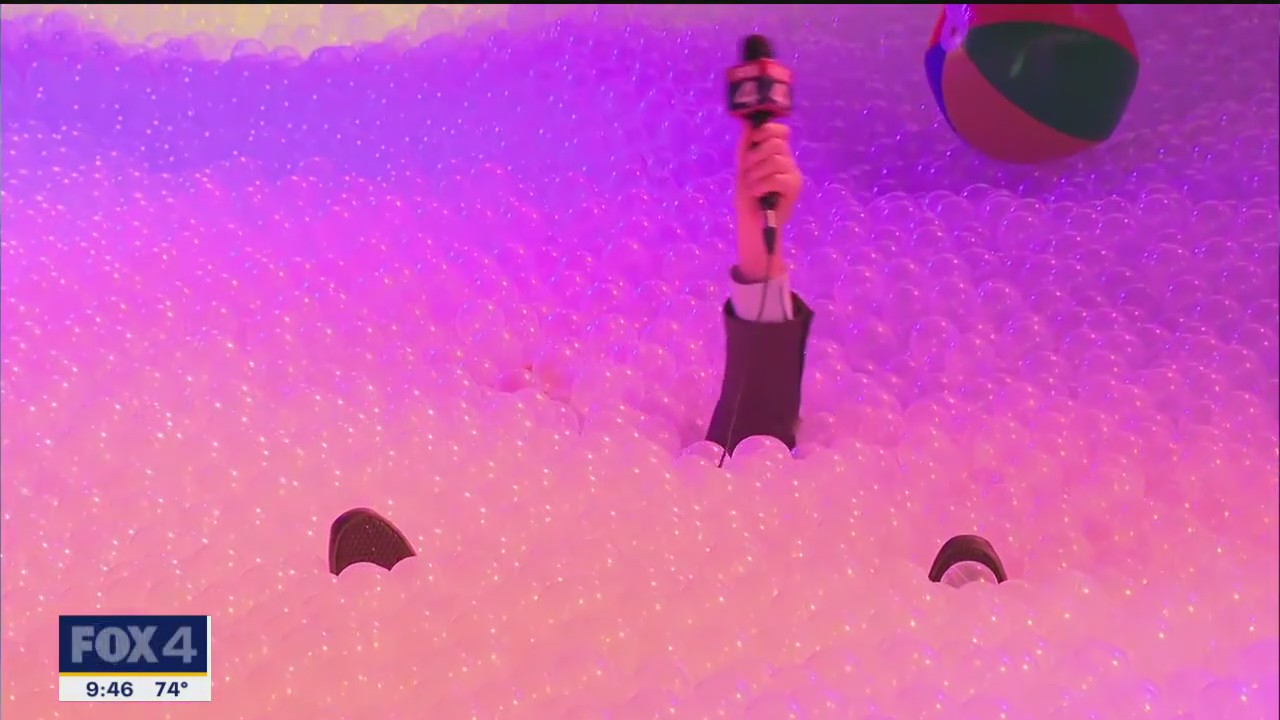 Reporter gets stuck in 'bubble bath' exhibit