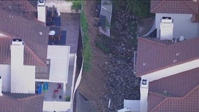 Corona residents evacuated after retaining wall collapses