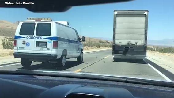 Coroner van caught on video nearly getting in wreck