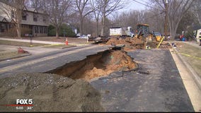 Crews working to repair massive sinkhole in Fairfax County road