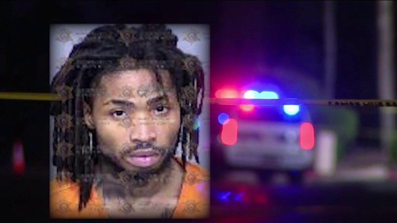 Man accused of firing at Phoenix officers identified