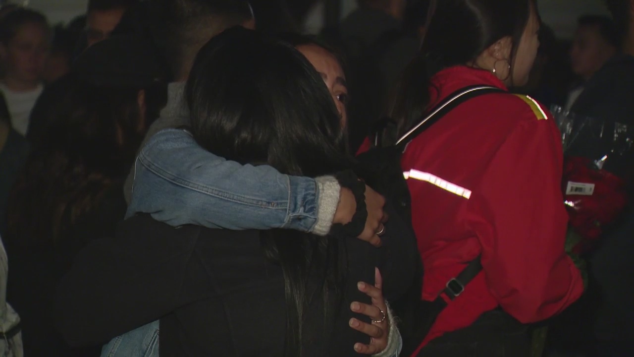 Students at UC Irvine hold candlelight vigil for fallen student