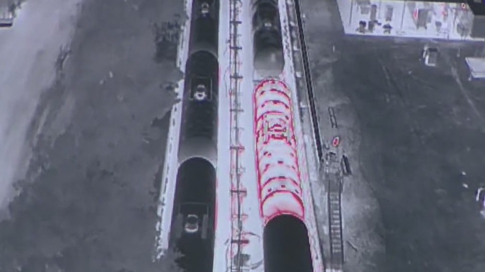 Fire officials say rising temps inside rail car could trigger blast