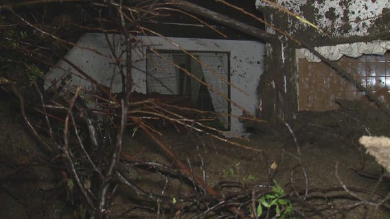 Wall of mud crashes into home in Encino