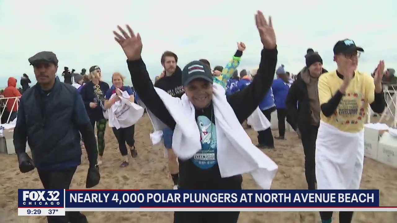 Thousands brave the frigid waters of Lake Michigan as part of the Polar Plunge