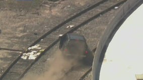 Standoff continues after wild chase in Boyle Heights